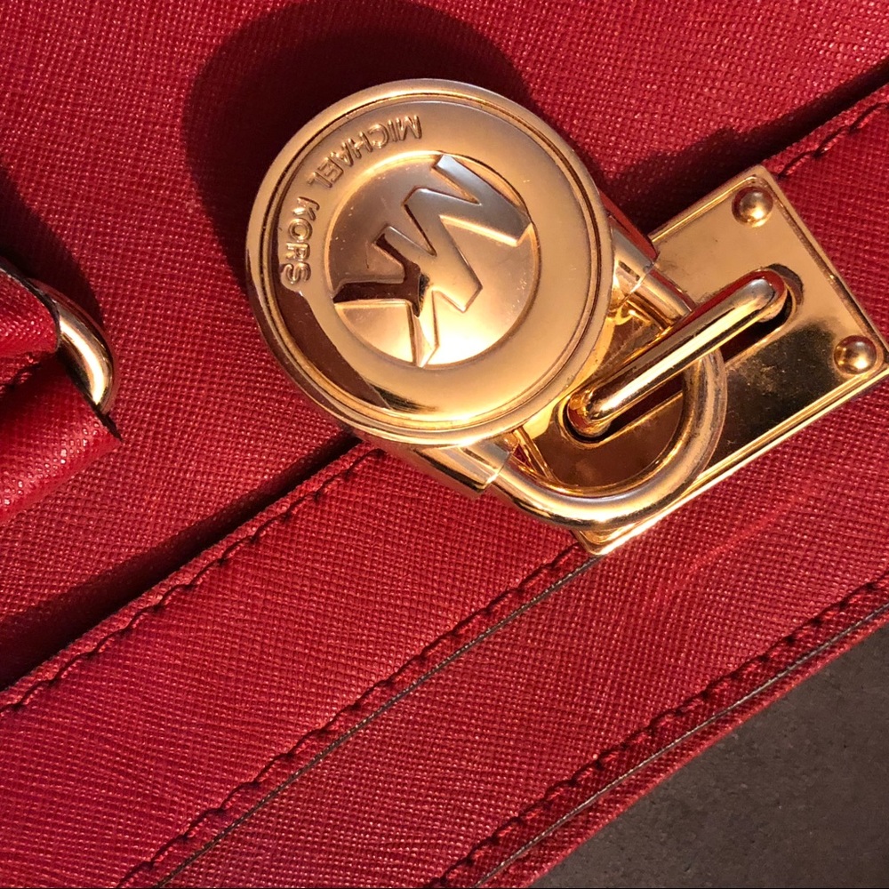 Original Michael Kors large satchel in burgundy.